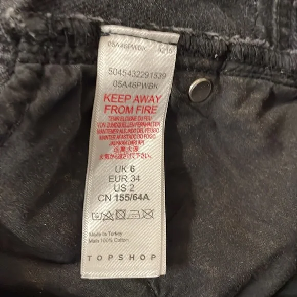 cheeky, black distressed jean shorts by Top Shop - Picture 6 of 7